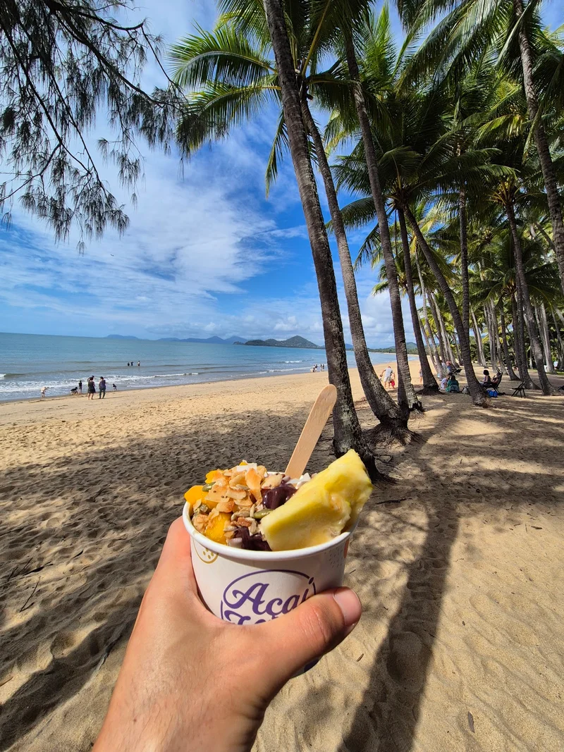 A fruit bowl enjoyed beside the palm-lined beach