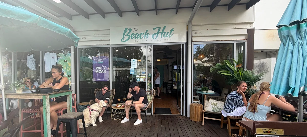 The Beach Hut entrance and outdoor seating on Veivers Road